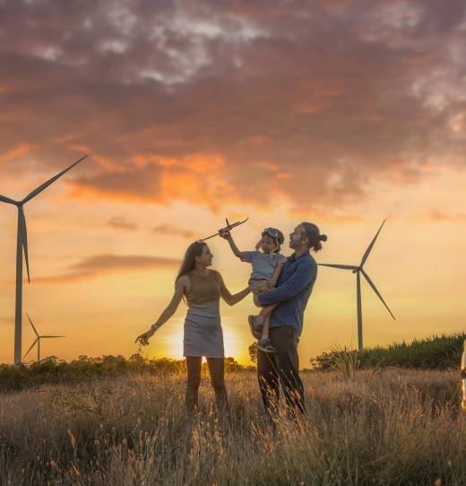 family-with-son-walking-on-field-on-wind-farm-2025-03-17-02-29-44-utc